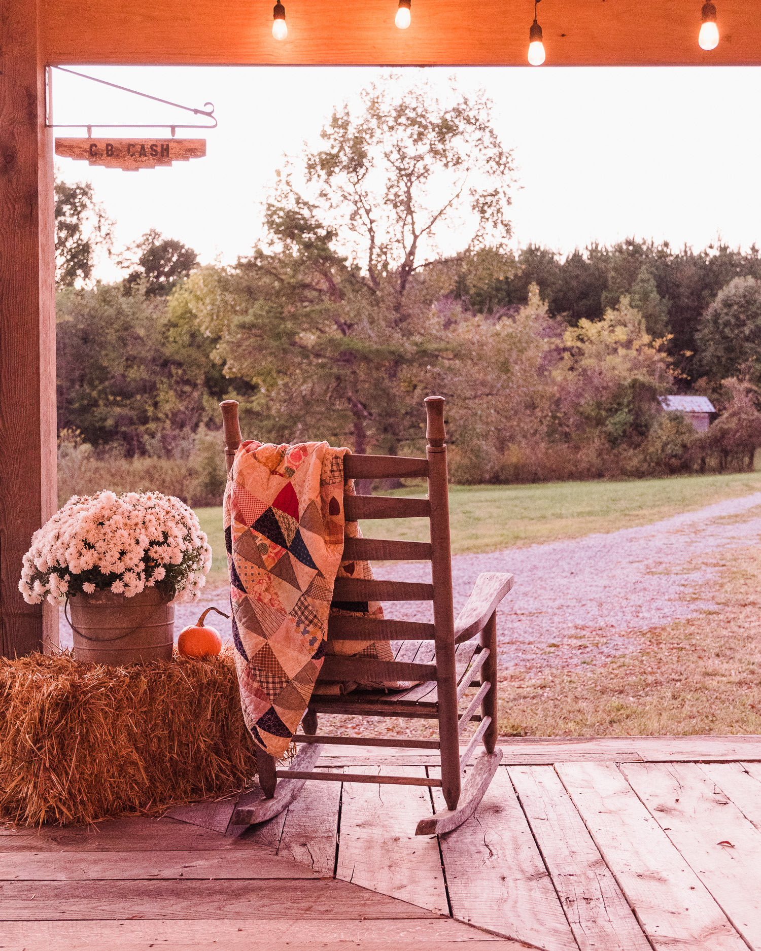 Decorating the barn porch for fall.