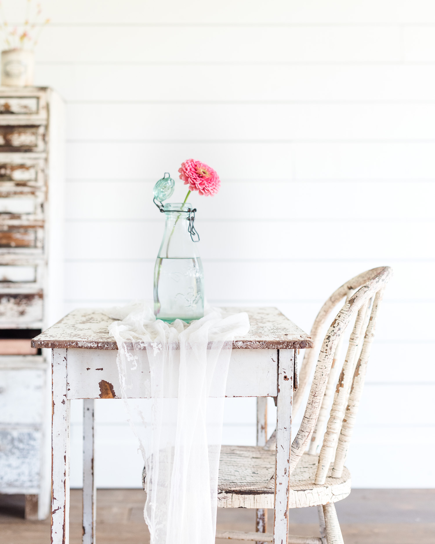 Collecting Vintage Vases. Vintage French Canning Jar, flower, voile, antique table & chair